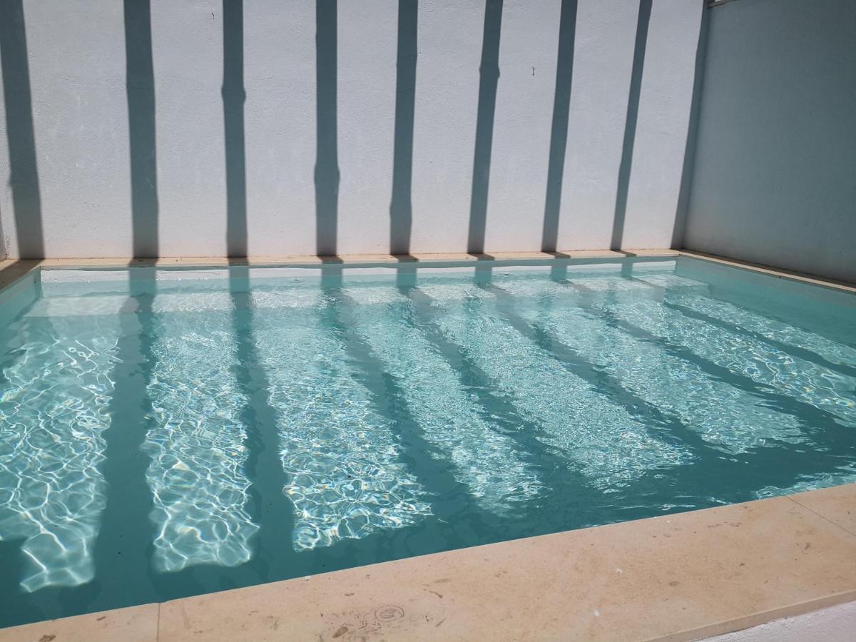 Apartamentos Duran Tirso De Molina เมรีดา ภายนอก รูปภาพ
