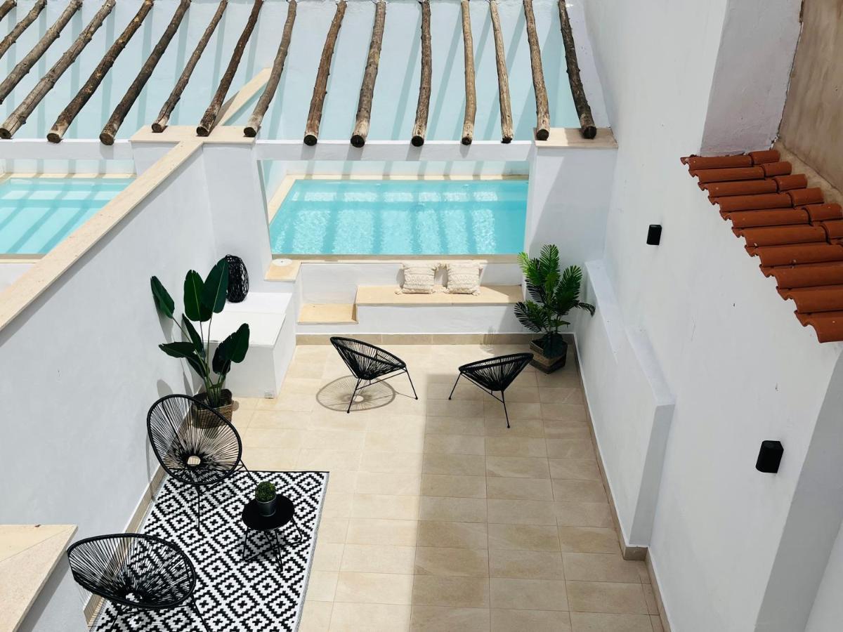 Apartamentos Duran Tirso De Molina เมรีดา ภายนอก รูปภาพ